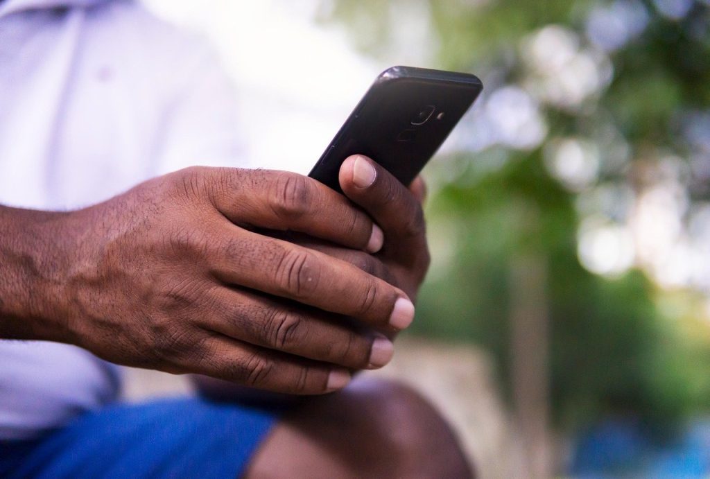 Hand holding a phone