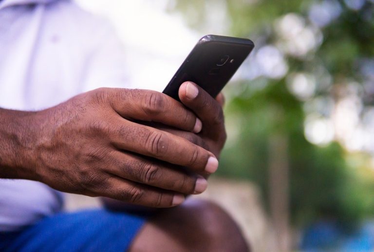 Hand holding a phone