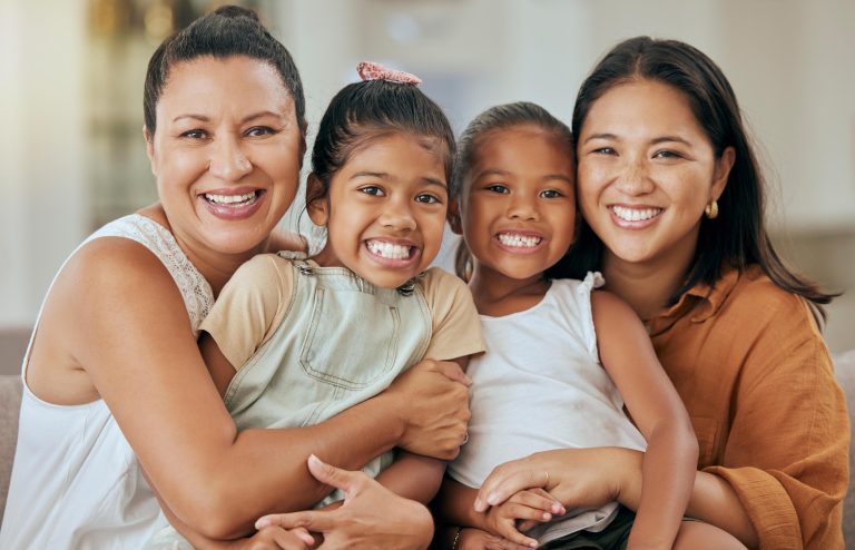 Smiling family of four